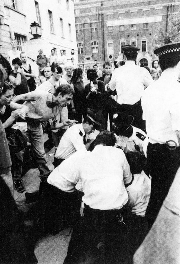 Police make an arrest outside Hackney Town Hall